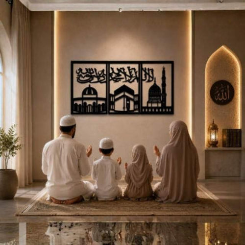 Family praying together in a home with Islamic decor