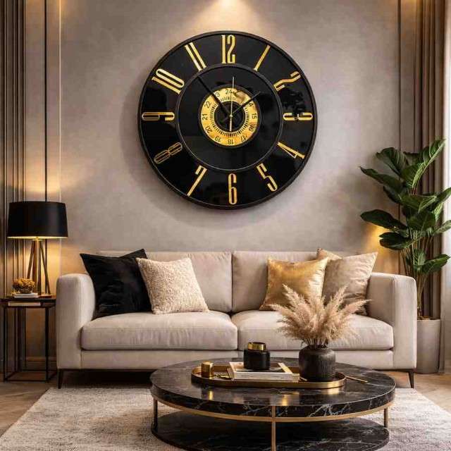 Decorative wall clock in a living room setting with a sofa and coffee table.