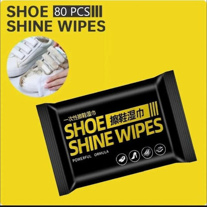 Pack of shoe shine wipes with a yellow background