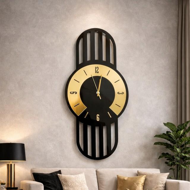 Decorative wall clock with black and gold design on a gray wall above a sofa.