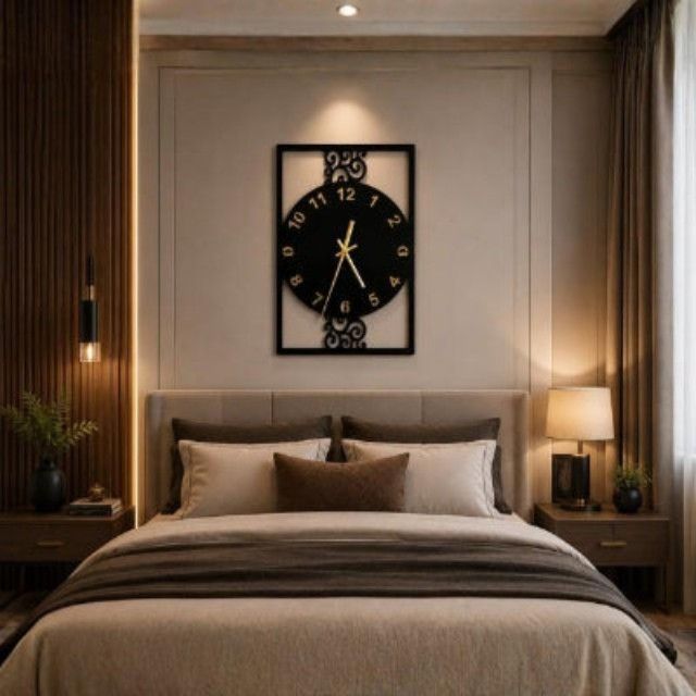 Decorative clock on a wall above a bed in a bedroom setting.